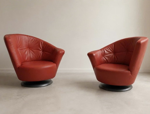 2 poltrone girevoli di design Giorgetti Arabella in pelle rossa