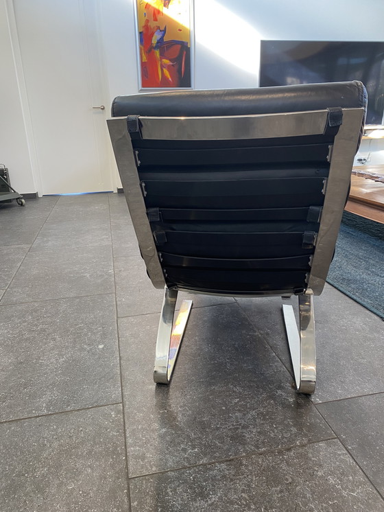 Image 1 of Poltrona lounge di design in legno nero con hocker