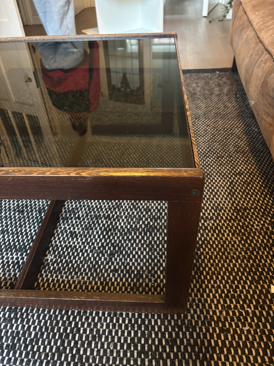 Image 1 of Vintage rosewood coffee table with smoked glass top