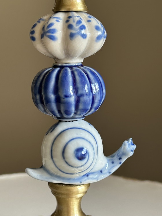 Handmade brass candle holder. Delft Blue figurine. Ceramic beads. – Nori Vinci (photo 3 of 9)