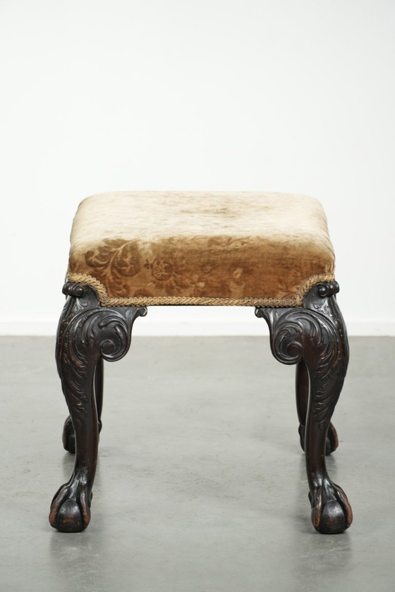 Image 1 of Antiek Hollands zitje/ hocker uit de 18e eeuw met velours stof, mooi houtsnijwerk en klauwpoten