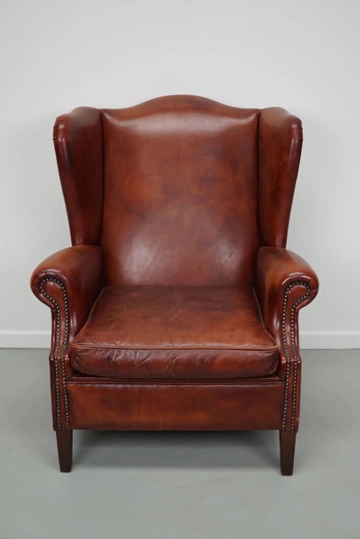 Niederländischer Vintage Ohrensessel in Cognac-Farbe aus Leder