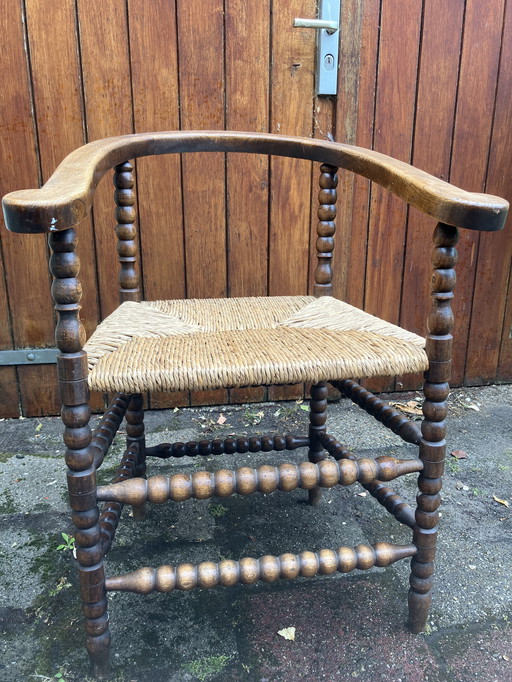 Antique 1920s chair with turned legs