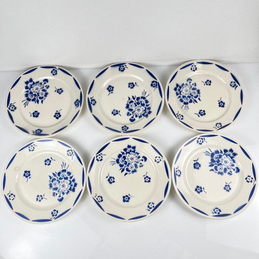 Set di 6 piattini da dessert in semiporcellana di Badonviller, decorati con motivi floreali blu, inizio XX secolo.