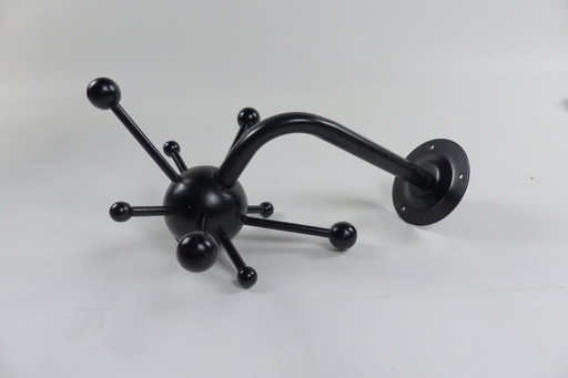 Coat rack in the taste of Osvaldo Borsani.