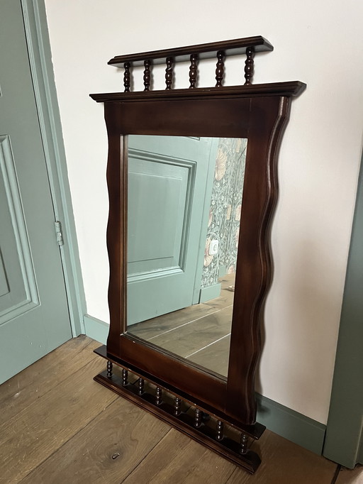 Classic vintage wall mirror with wooden frame