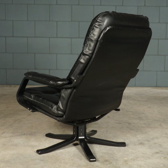 Image 1 of Vintage Unico draaifauteuil met hocker – jaren 70