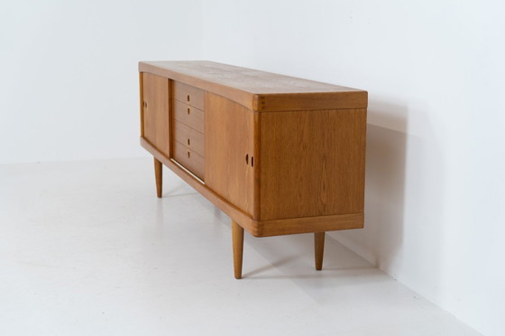 Image 1 of Sideboard by Henry W. Klein for Bramin in oak (Denmark, 1960s).