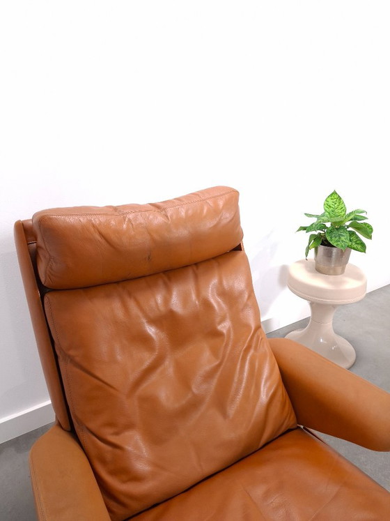 Poltrona Vintage COR Swing con pouf, Reinhold Adolf, Pelle Cognac – Poltrone (photo 8 of 22)