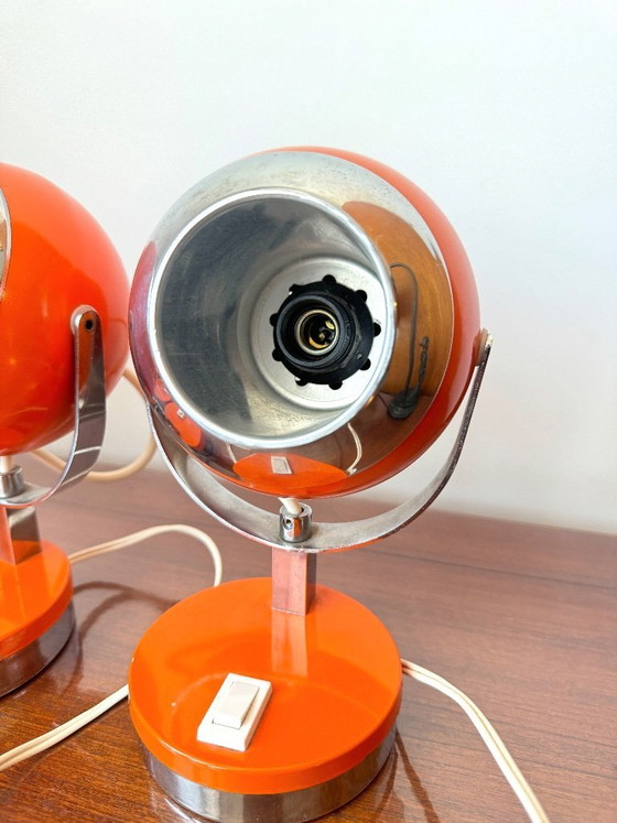 Image 1 of Set van 2 oranje oogbollampen, 1970.