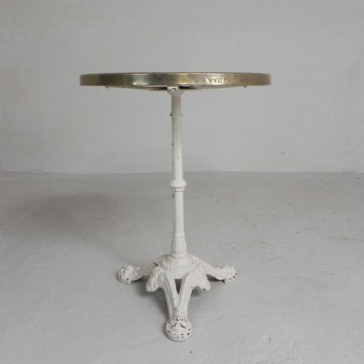 Mesa de bistró con patas de hierro fundido y tablero de mármol, década de 1920.