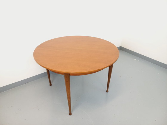 Image 1 of Vintage Scandinavian style round teak dining table from the 1950s/60s with extension