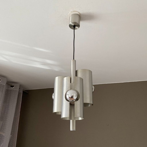 Space Age pendant light. 1970. Brushed stainless steel.