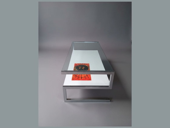 Image 1 of Mesa de centro Belarti con panel artístico de vidrio, cromo y cerámica.