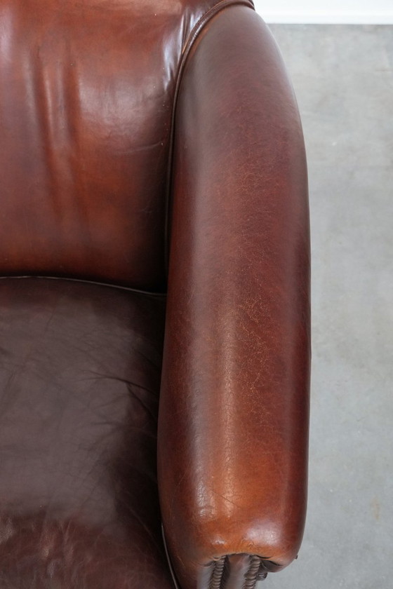 Image 1 of 2 x Vintage schapenleren clubfauteuil met siernagels 