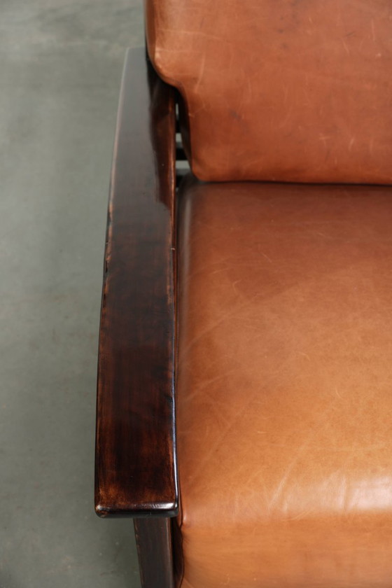 Elegant cowhide armchair with beautiful details in timeless Art Deco design – Leather, Klassiek (photo 7 of 12)