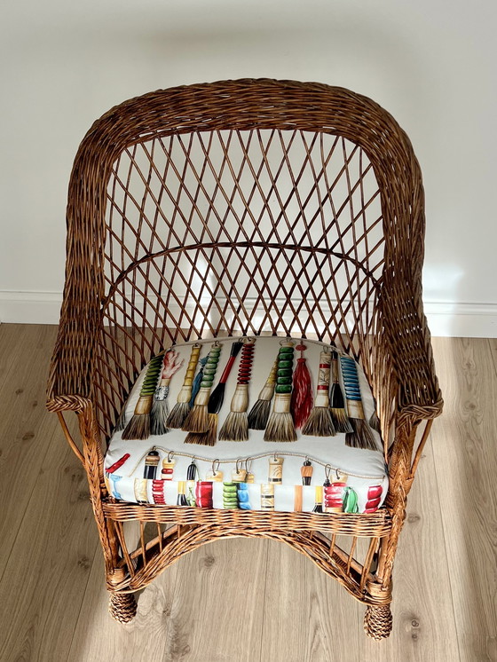 Image 1 of Pierre Frey geflochtener Sessel mit Kissen