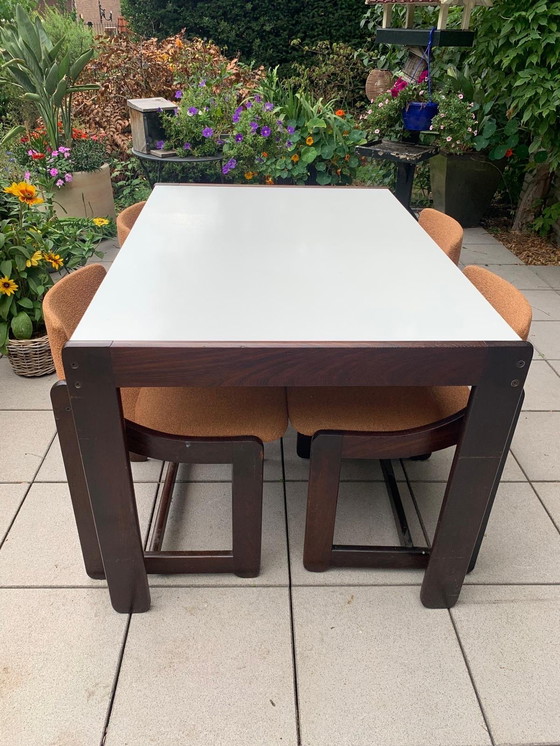 Image 1 of Wengé eetkamer nieuw gestoffeerd tafel met origineel formica blad.