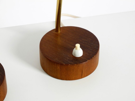 Image 1 of A pair of beautiful mid-century modern bedside lamps with perforated metal shades and teak wood bases