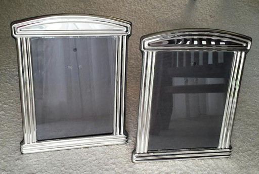 Due grandi cornici portafoto argentate