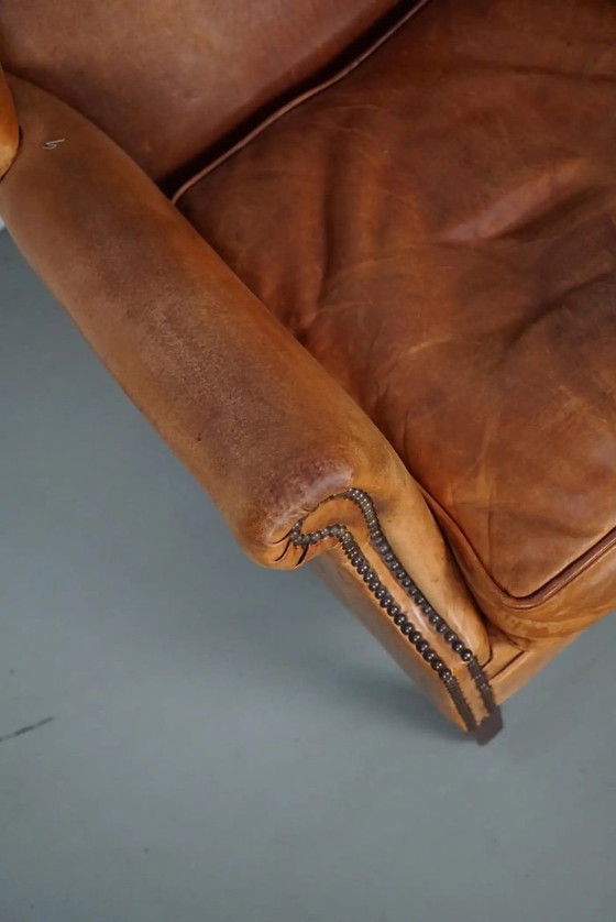 Image 1 of Vintage Nederlandse clubfauteuil van cognackleurig leer