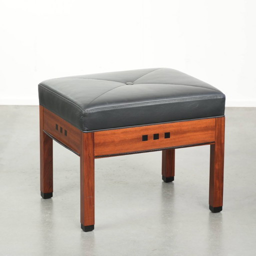 Black cowhide leather designer ottoman by Schuitema in Art Deco style from the Decoforma series – hockers en poefs