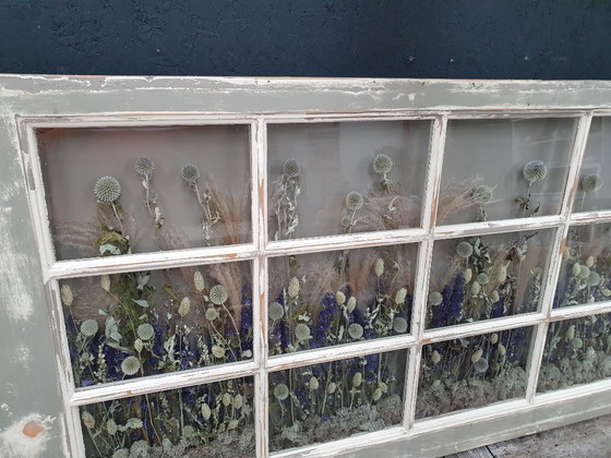 Image 1 of Marco con flores secas