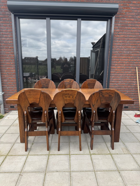 Image 1 of Brutalist eetstoelen (6st) en eettafel
