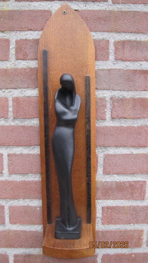 Escultura Maternité según René Daemen con consola Art Déco.