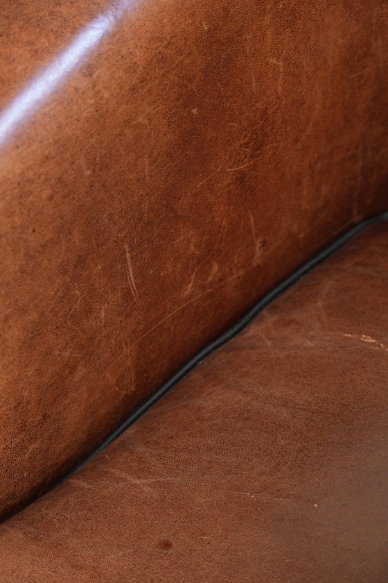 Image 1 of 2x schapenleren Art Deco design clubfauteuil met een mooi patina, zwarte biezen en mooie kleuren