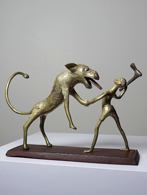 Bronze du Dahomey, Bénin Afrique, vintage/ancien XXe "Le chasseur et la bête"