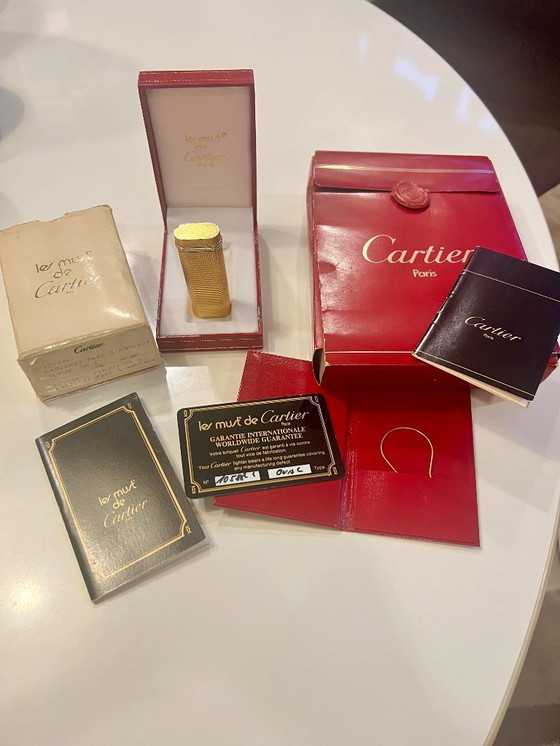 Image 1 of Original vintage Cartier Lighter gold-plated with Trinity ring made in 1983 with certificate, original box and case