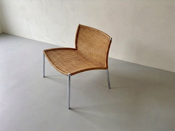 Image 1 of Vintage rattan lounge chair with chrome legs