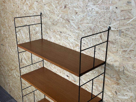 Image 1 of Anni '60-'70 scaffale in teak Scaffale a muro WHB Germania Scaffale a corda Design danese