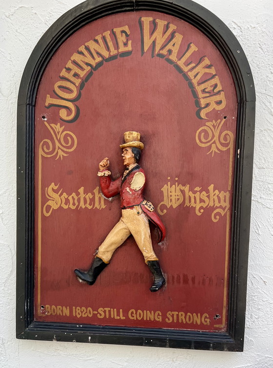 Image 1 of JOHNNIE WALKER – Original vintage wooden plaque with 3D relief figure “The Striding Man” (ca. 1970s)