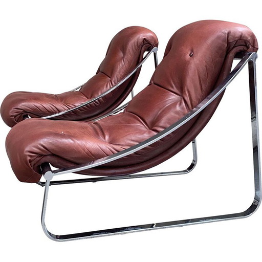Coppia di poltrone vintage in acciaio inossidabile e pelle rivestite di Roche&Bobois, 1970