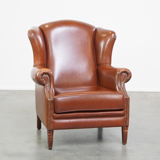 Image 1 of Fauteuil à oreilles en cuir de boeuf