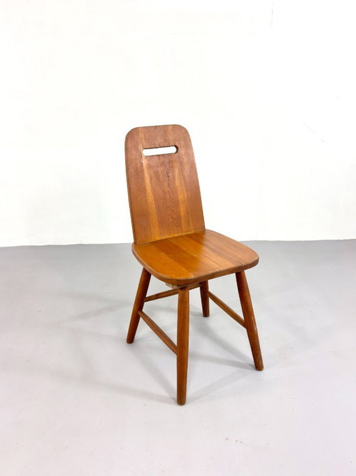 Chaise vintage scandinave de style brutaliste, signée Eero Aarnio, en bois, design danois du milieu du XXe siècle.