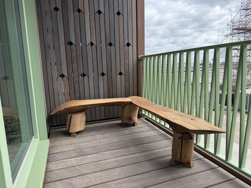 Boomstam hoek bankje