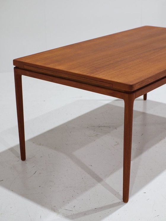 Mesa de comedor rectangular extensible de Johannes Andersen, teca danesa, década de 1960. – Mesas de comedor (photo 8 of 17)