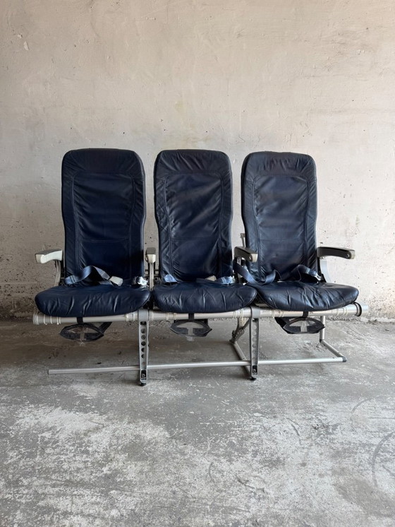 Image 1 of Vintage driepersoons vliegtuigstoelen - Recaro