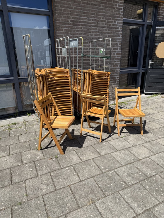 Image 1 of Partij van 53x vintage hardhouten klapstoel ‘80
