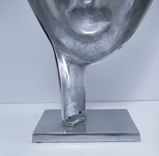 Image 1 of sculpture visage stylisé métal poli