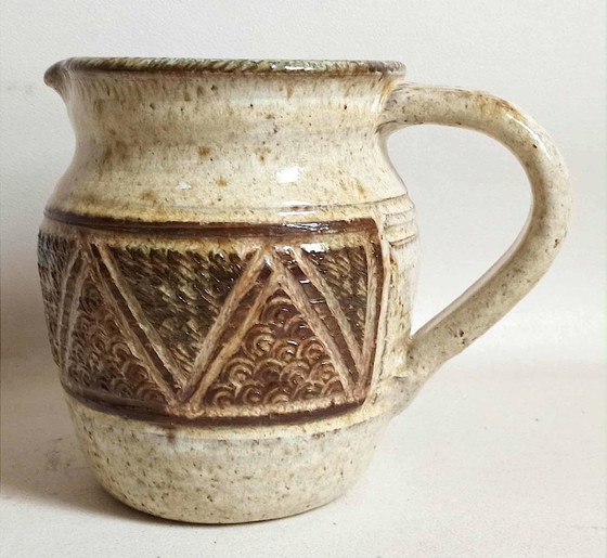 Image 1 of Stoneware pitcher stamped Giraud. Height 18.5 cm
