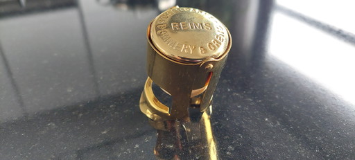 Champagnerverschluss des Weinguts Pommery, 24-karätig vergoldet