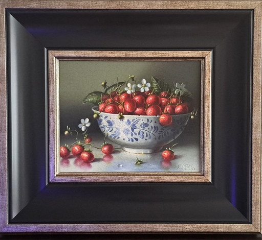 Wild strawberries in antique bowl