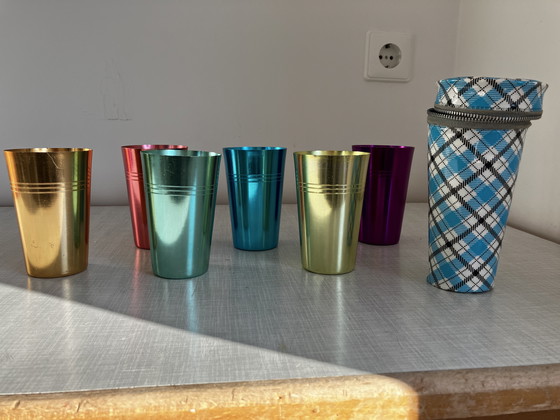 Image 1 of 6 metal retro cups in a tube