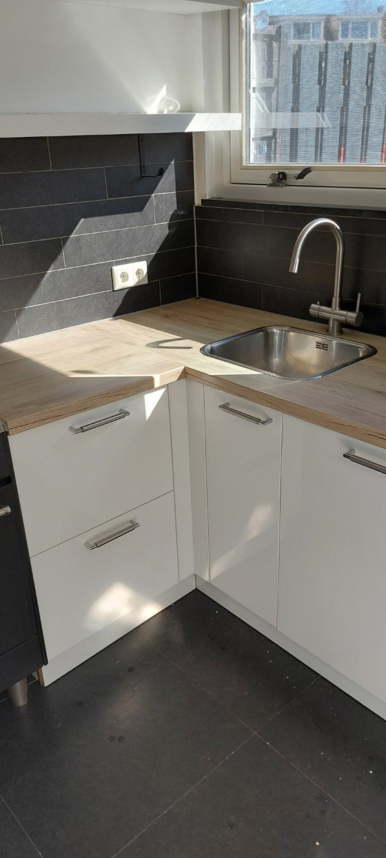 Image 1 of Complete kitchen including built-in appliances and freestanding stove