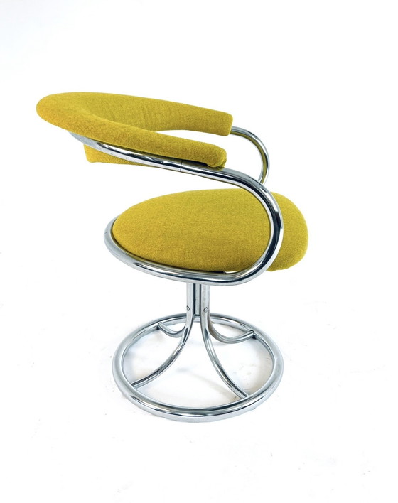Image 1 of Sedia girevole con struttura tubolare