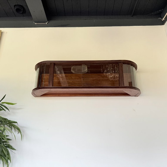 Image 1 of Subtle hanging display case with polished slats